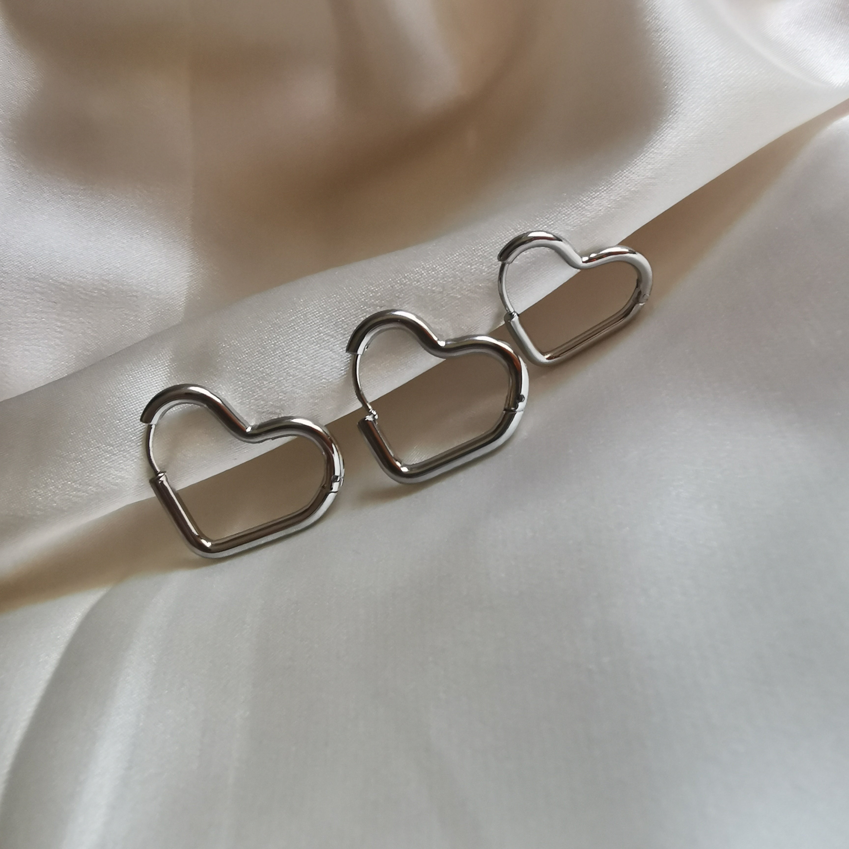 ORECCHINI CUORI VUOTI